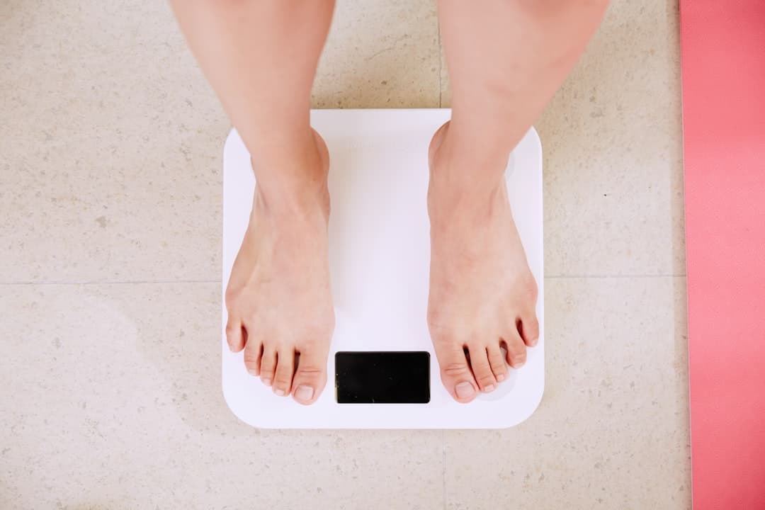 Person standing on a digital bathroom scale